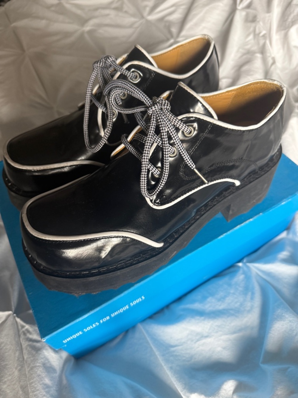 John Fluevog YRSA Black Platform Lace-Up Shoes with White Piping.